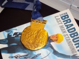 Steven Bradbury medal and  last man standing book